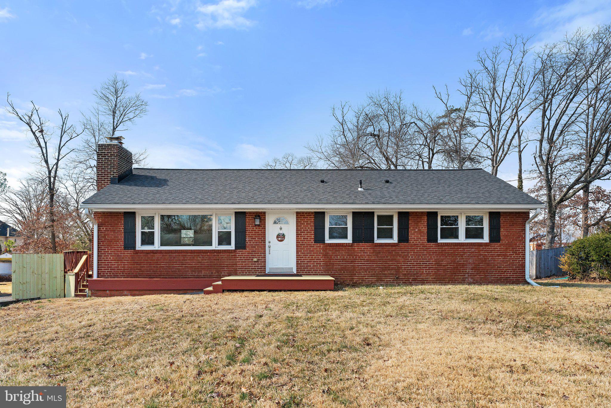 6408 Zekan Lane Springfield, VA 22150 - Photo 66 of 72 a front view of a house with a yard