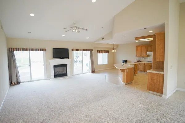 a view of a house with outdoor space and sitting area