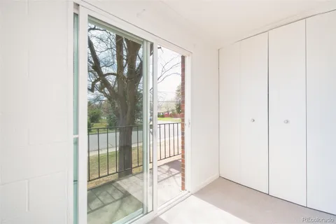 a view of a balcony with city view