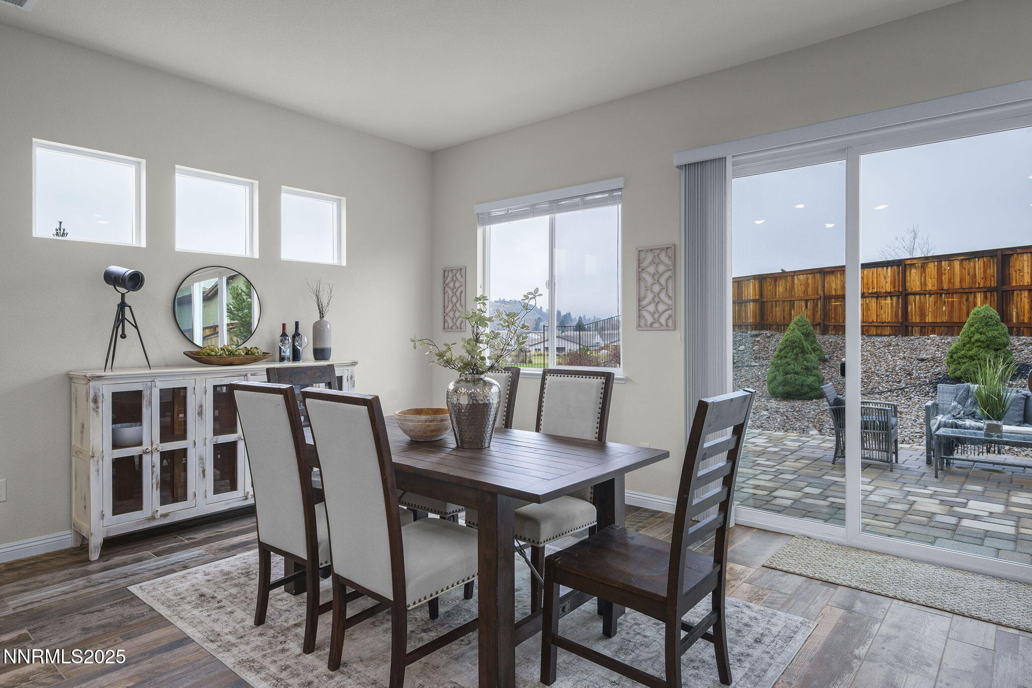 8326 Simsbury Drive Reno, NV 89439 - Photo 11 of 33 a view of a dining room with furniture window and outside view