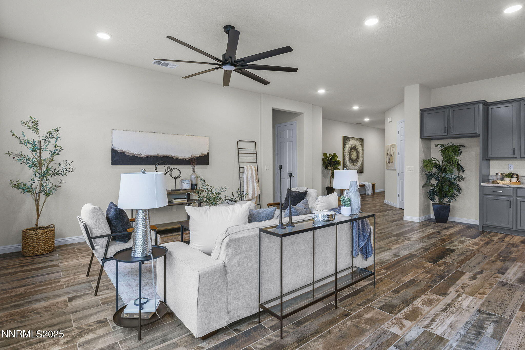 8326 Simsbury Drive Reno, NV 89439 - Photo 6 of 33 a living room with furniture and a large window