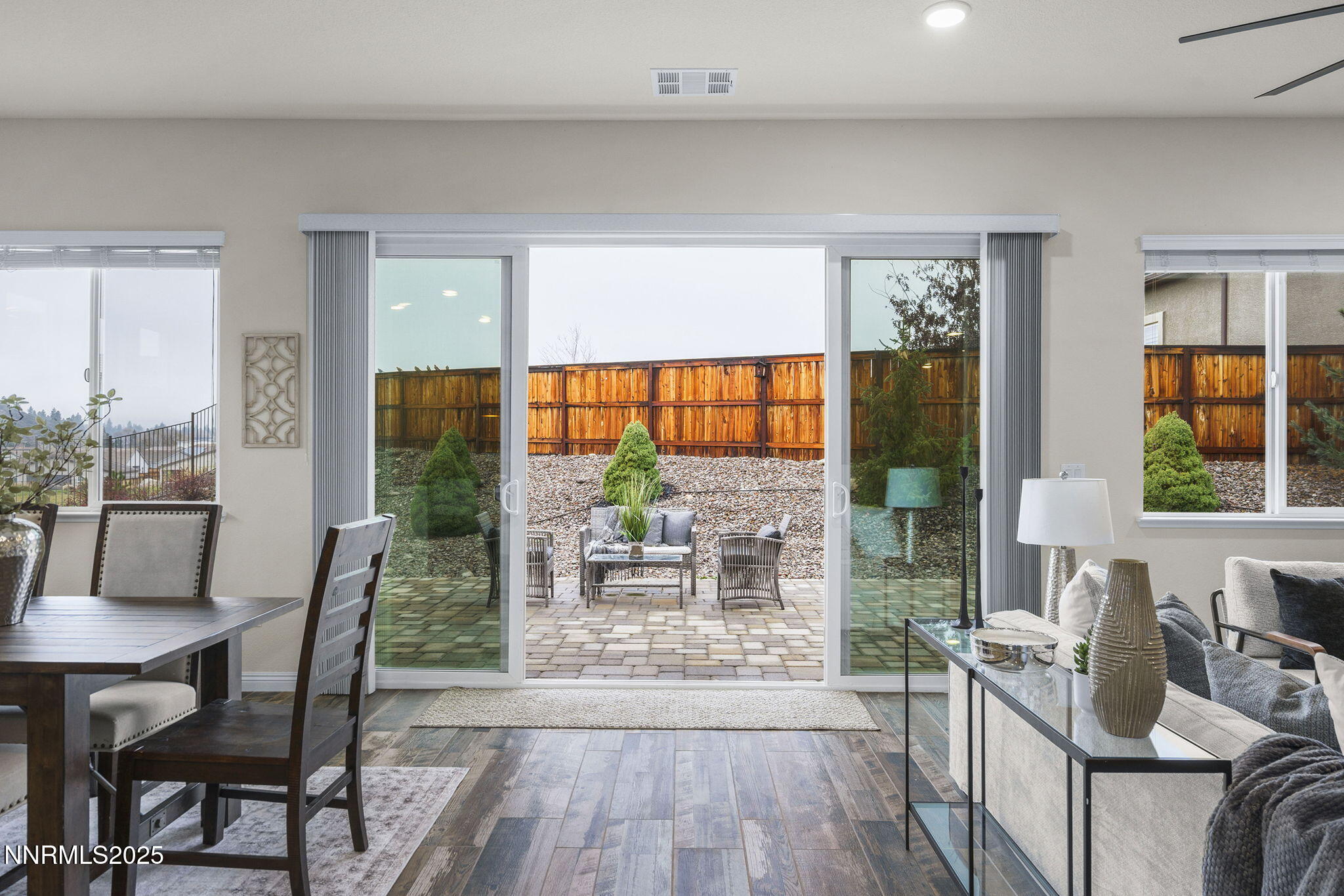 8326 Simsbury Drive Reno, NV 89439 - Photo 10 of 33 a living room with furniture and a large window