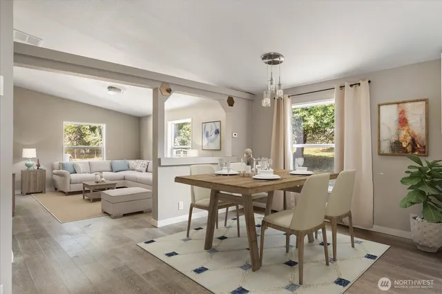 a view of a livingroom with furniture and window