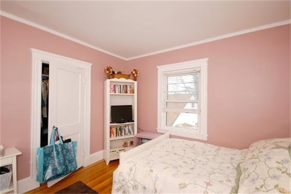 17 Cotter Road, Unit 17 Newton, MA 02468 - Photo 14 of 18 a bedroom with a bed and a flat tv screen on dresser