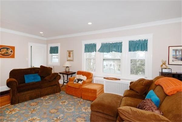 17 Cotter Road, Unit 17 Newton, MA 02468 - Photo 4 of 18 a living room with furniture and a large window