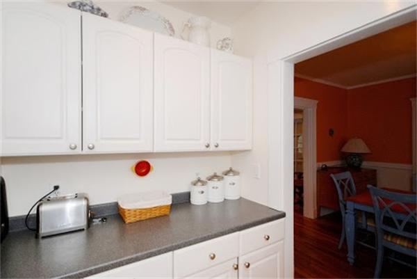 17 Cotter Road, Unit 17 Newton, MA 02468 - Photo 10 of 18 a kitchen with a sink cabinets and wooden floor