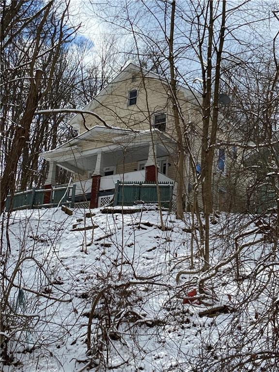 126 Spring Street Aliquippa, PA 15001 - Photo 2 of 2 a view of a yard with a tree