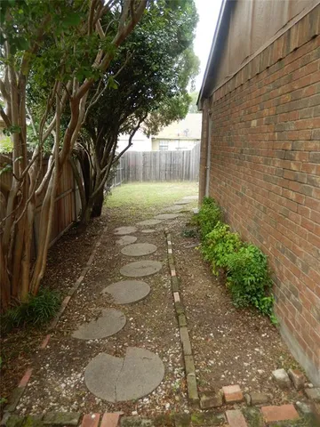 a view of backyard with green space
