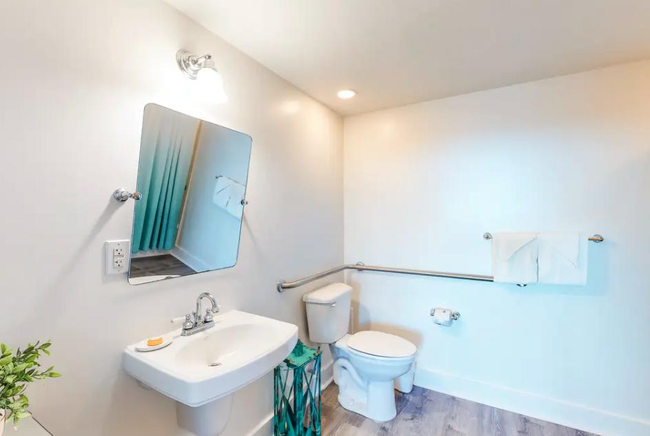 1110 Santa Rosa Boulevard, Unit A621 Fort Walton Beach, FL 32548 - Photo 11 of 20 a bathroom with a toilet sink and mirror