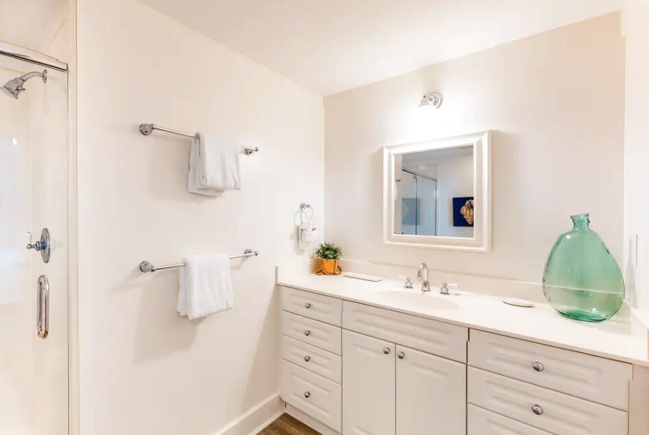 1110 Santa Rosa Boulevard, Unit A621 Fort Walton Beach, FL 32548 - Photo 14 of 20 a bathroom with a sink vanity granite and a mirror