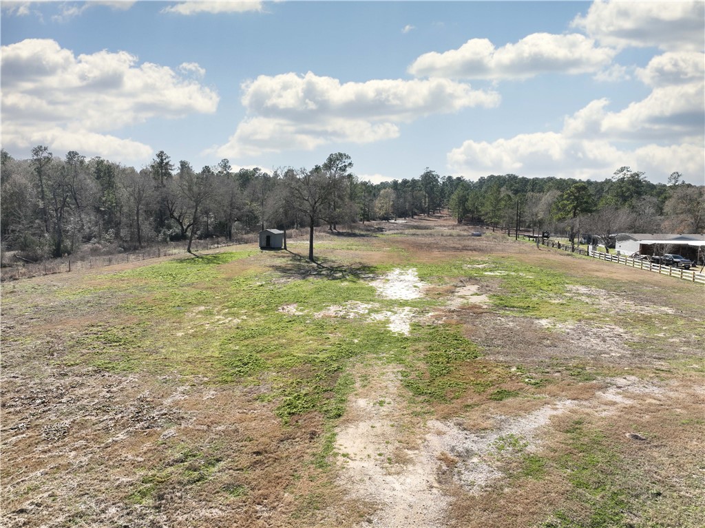 12082 State Highway 30 Anderson, TX 77830 - Photo 4 of 25 a swimming pool with trees in the background