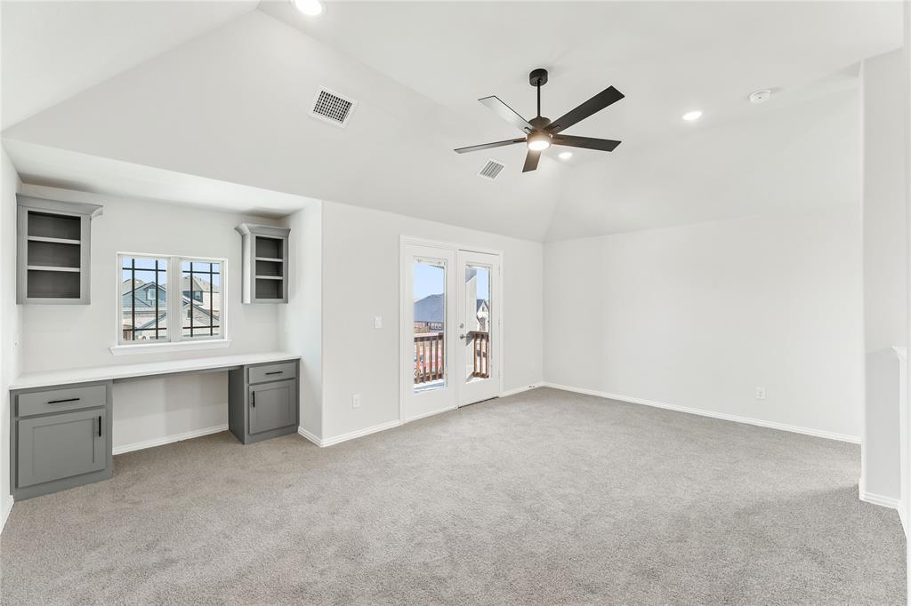 8 Grouse Circle Sanger, TX 76266 - Photo 24 of 40 a view of an empty room with window and cabinet