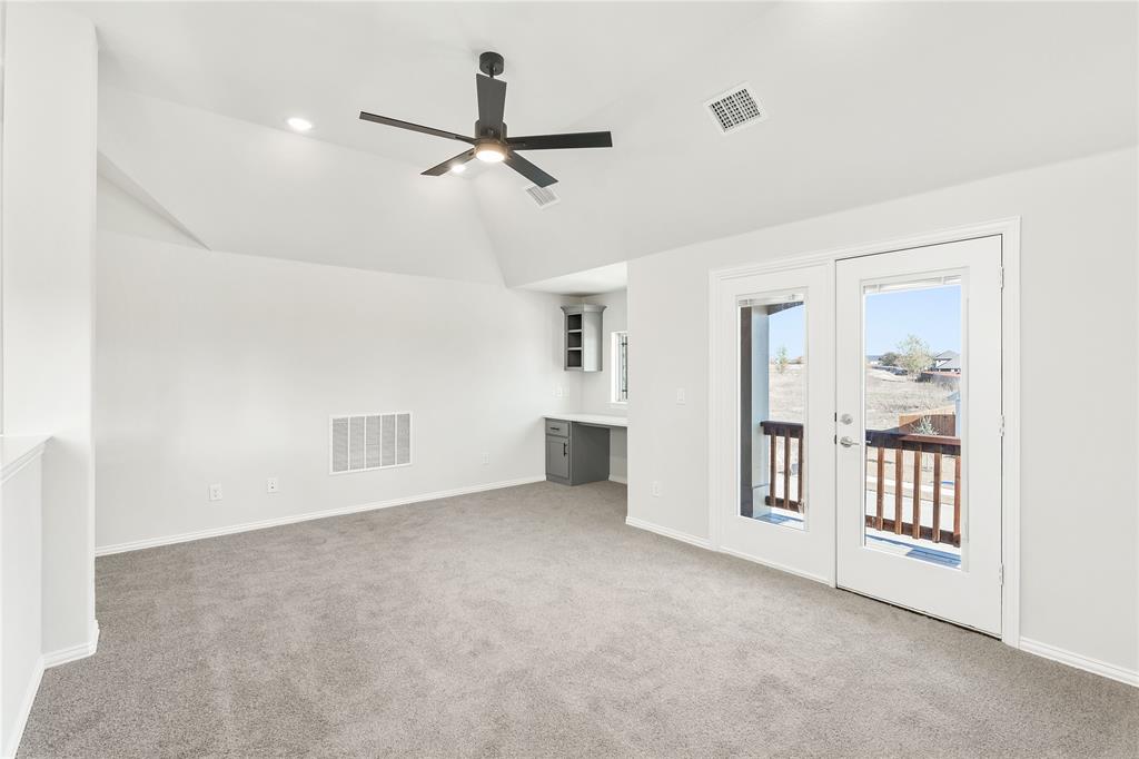 8 Grouse Circle Sanger, TX 76266 - Photo 26 of 40 a view of a livingroom with a ceiling fan and window
