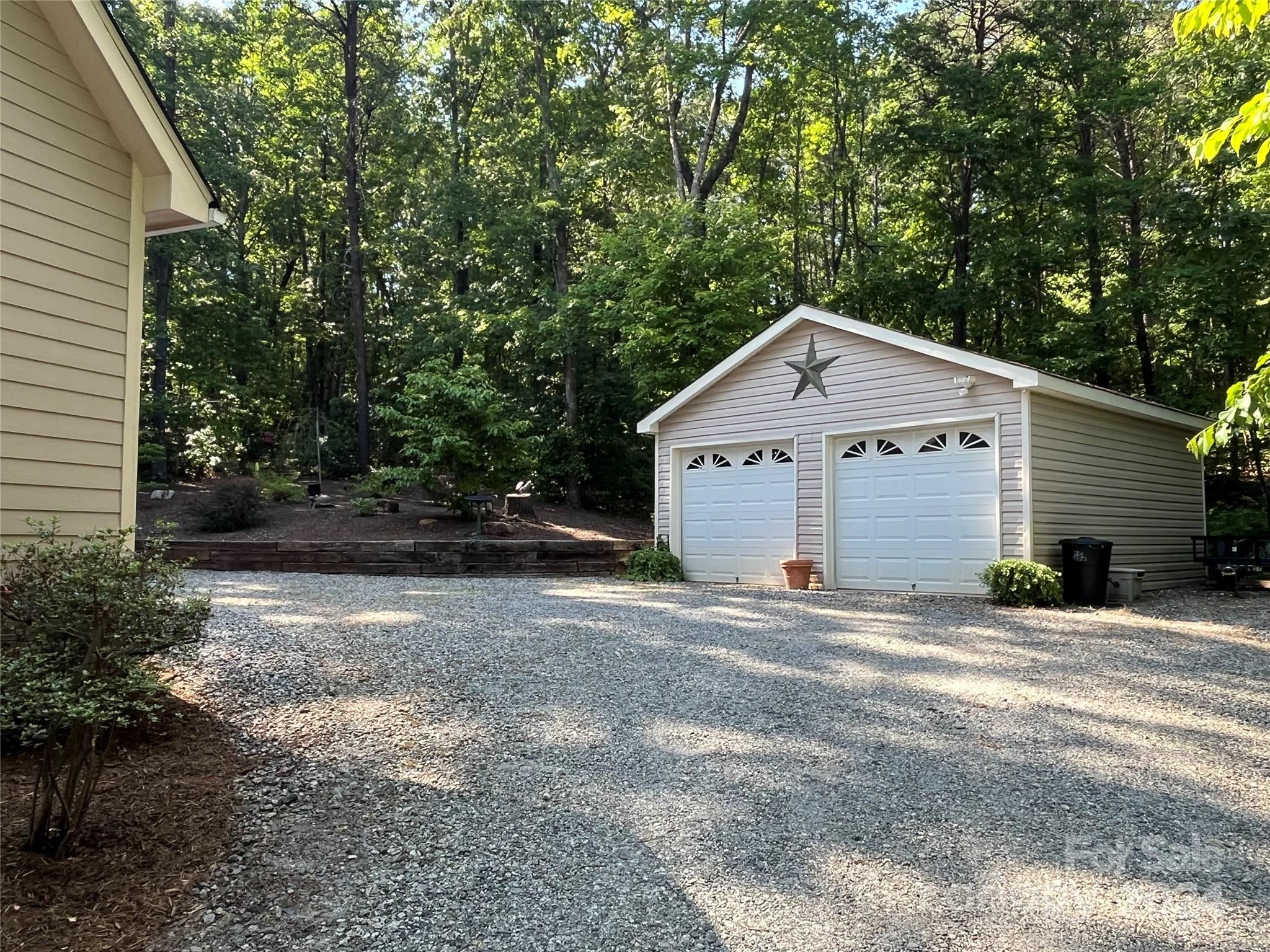 2053 Edgerton Road Mill Spring, NC 28756 - Photo 5 of 46 a view of backyard of house