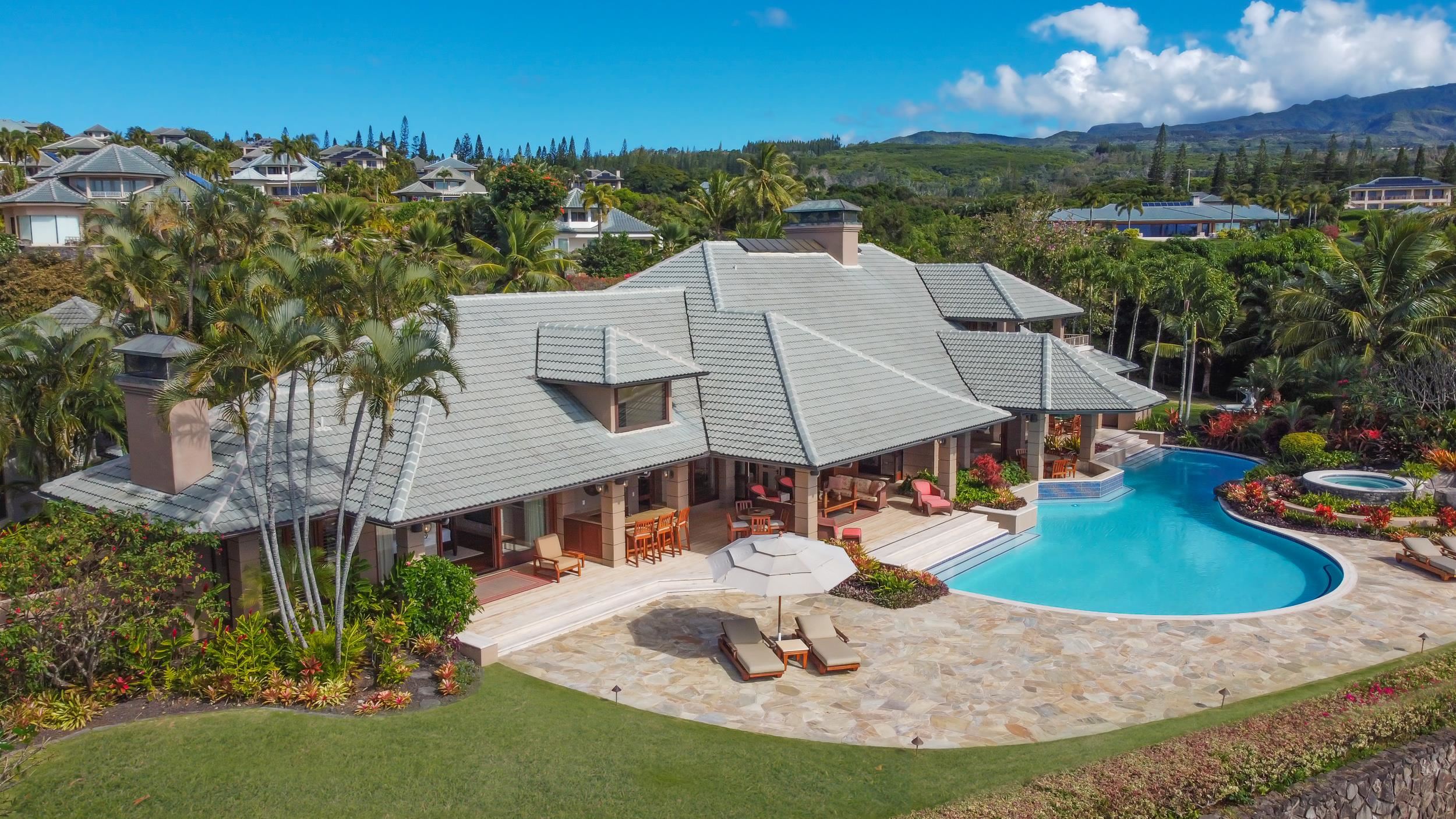 1216 Summer Road Lahaina, HI 96761 - Photo 1 of 26 a view of a house with swimming pool and yard