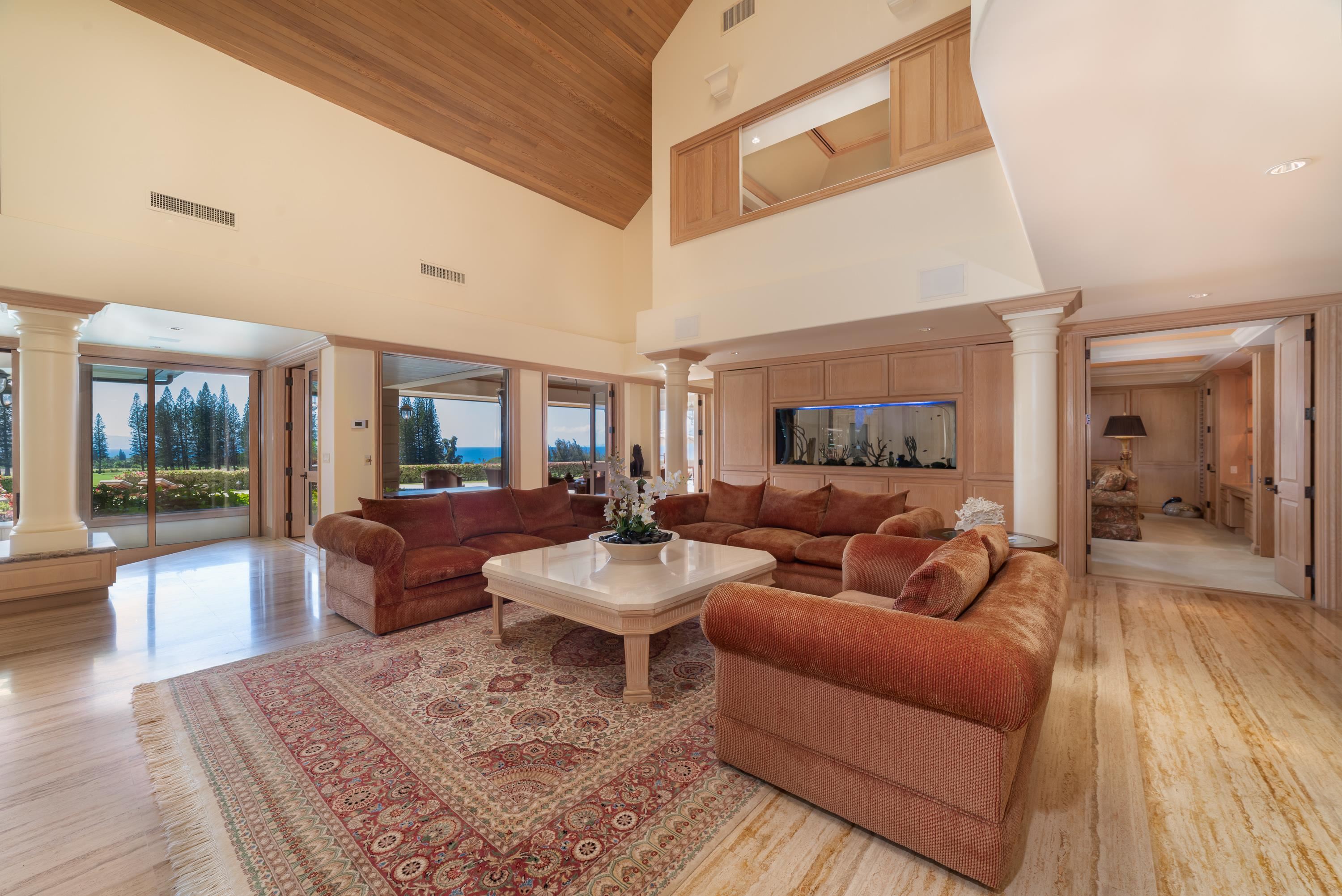 1216 Summer Road Lahaina, HI 96761 - Photo 12 of 26 a living room with furniture and a wooden floor