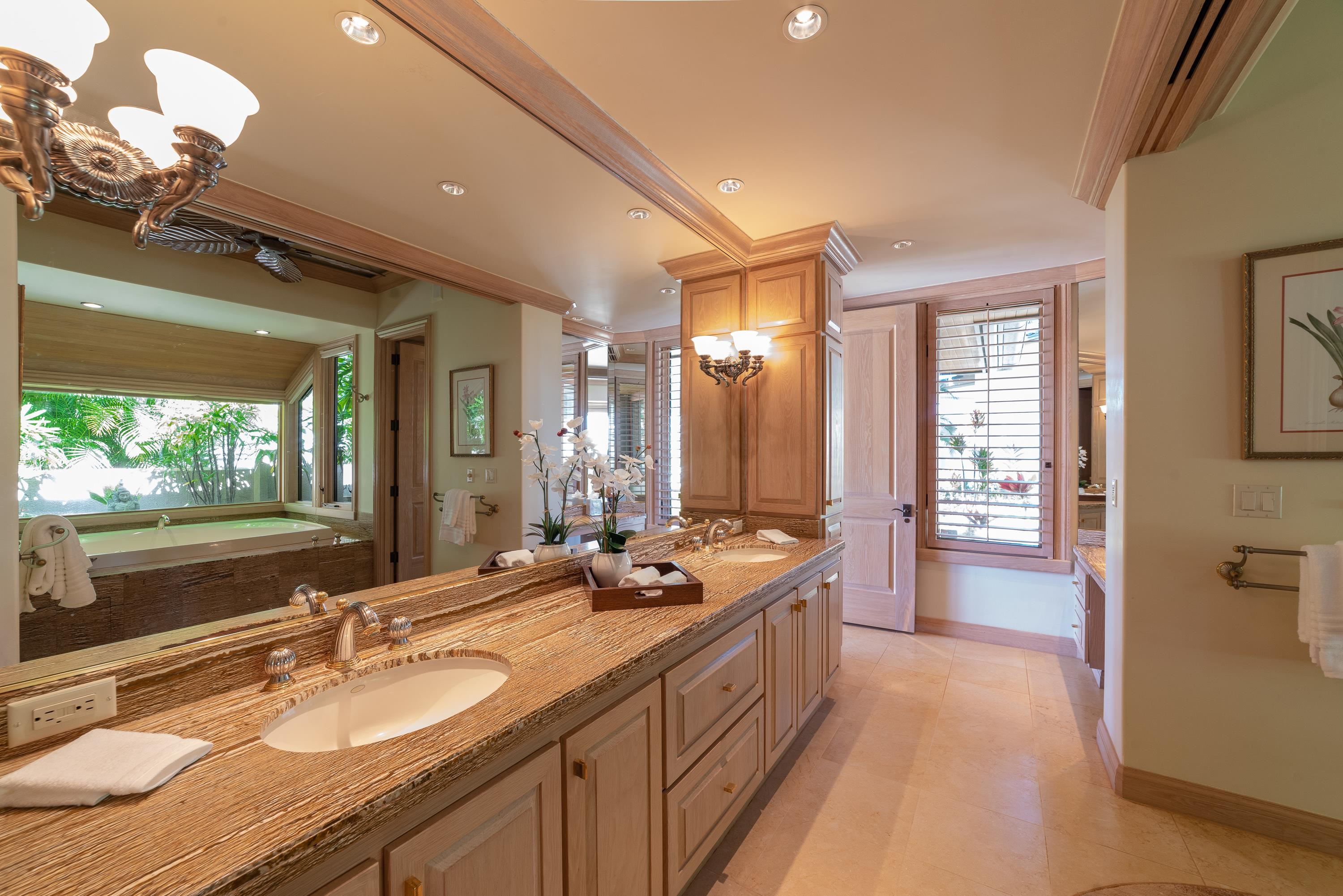 1216 Summer Road Lahaina, HI 96761 - Photo 17 of 26 a spacious bathroom with a sink double vanity granite and a large mirror