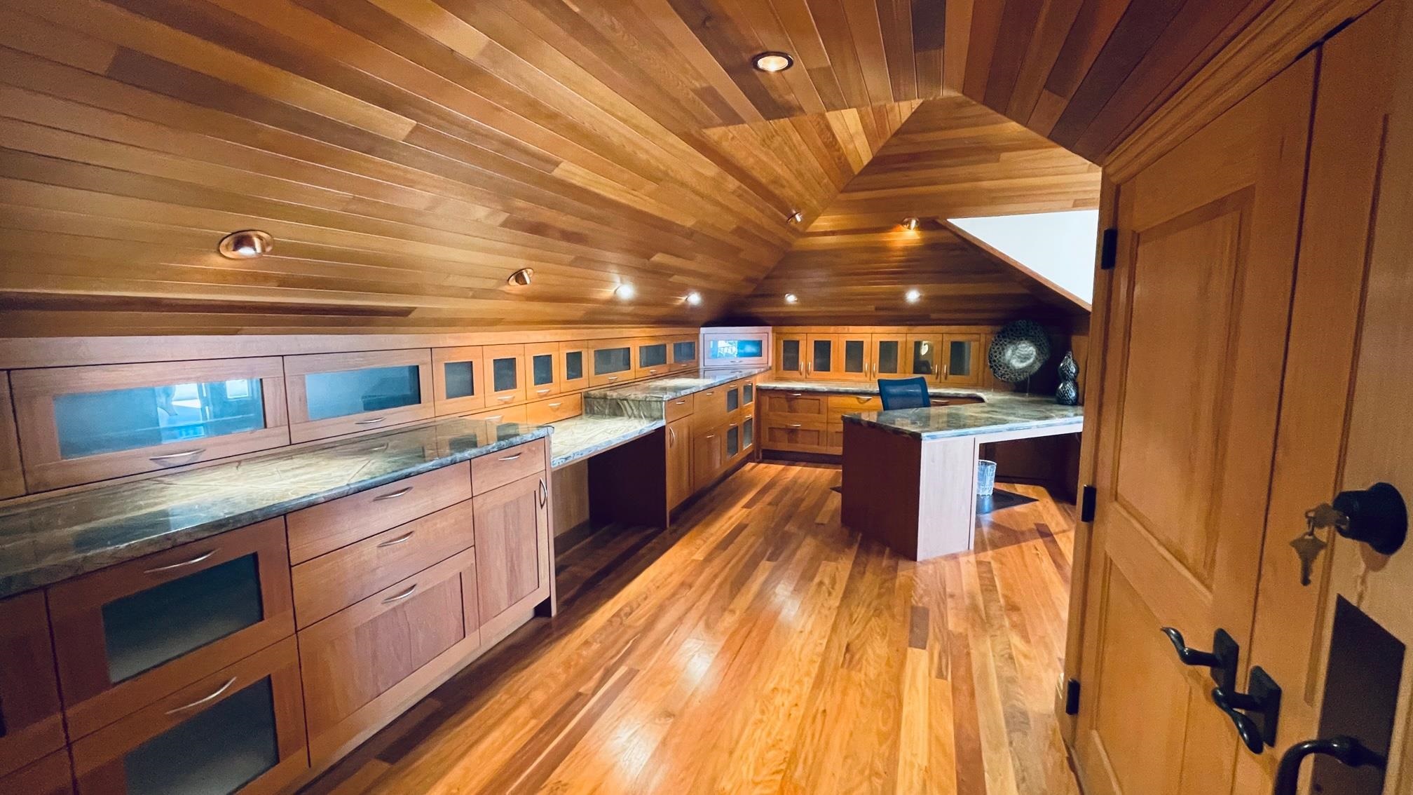 1216 Summer Road Lahaina, HI 96761 - Photo 20 of 26 a kitchen with stainless steel appliances wooden cabinets and a stove