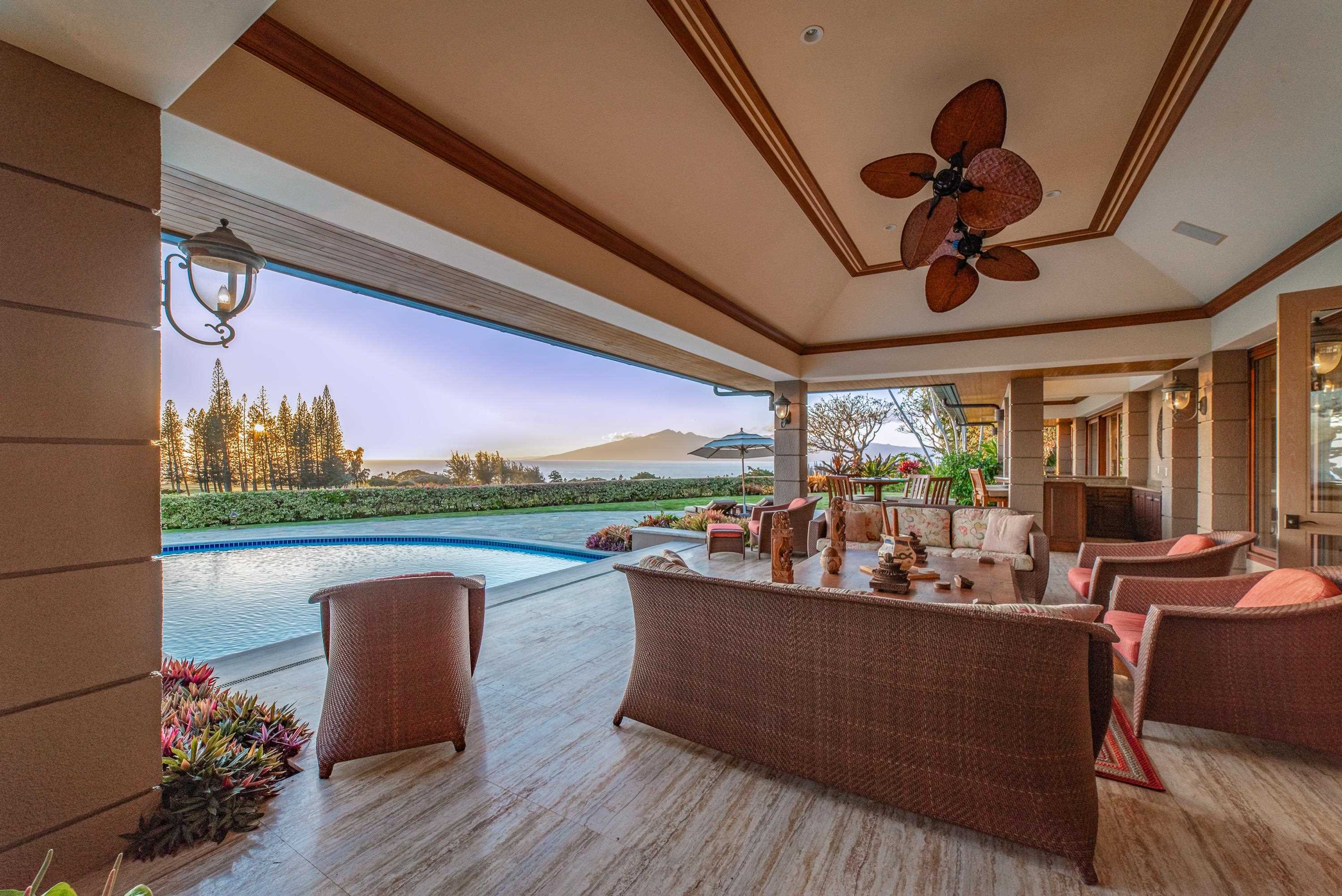 1216 Summer Road Lahaina, HI 96761 - Photo 21 of 26 a view of a couches and dinning table in the balcony