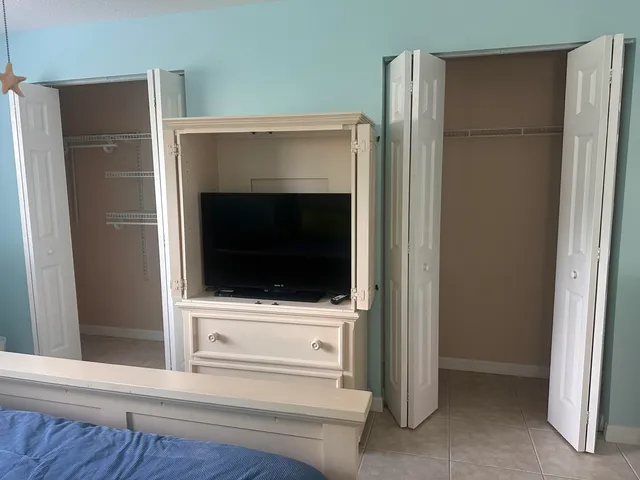a view of a kitchen from a hallway