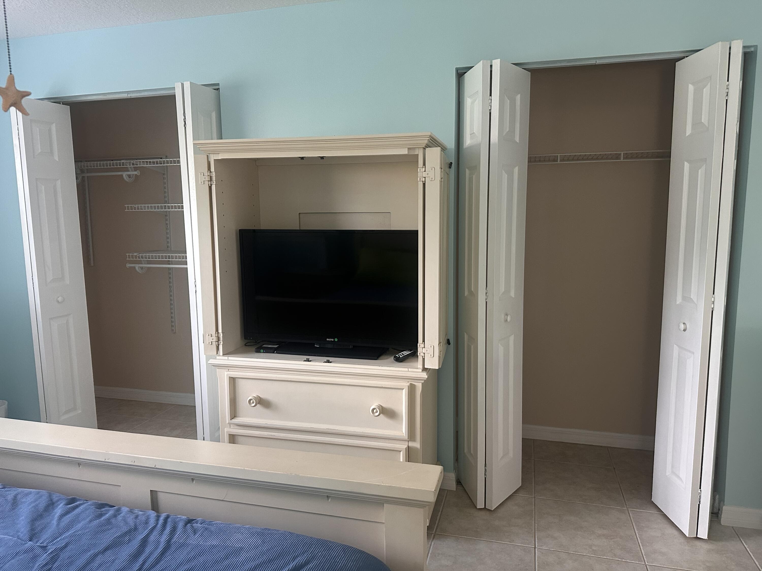 2950 Southeast Ocean Boulevard, Unit 182 Stuart, FL 34996 - Photo 8 of 13 a view of a kitchen from a hallway