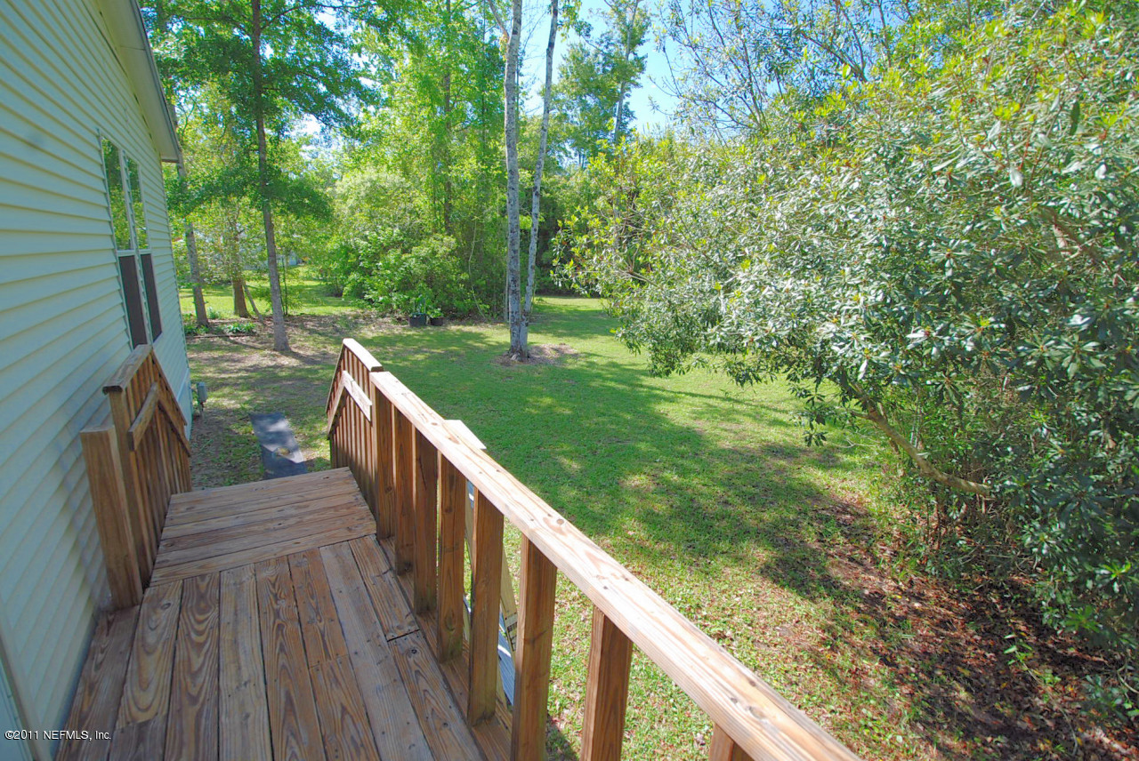 43327 Ratliff Road Callahan, FL 32011 - Photo 22 of 30 Steps to Side Yard