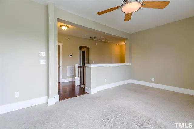 a view of a livingroom with a staircase