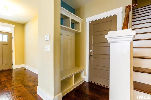 a view of walk in closet and bedroom