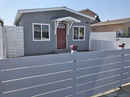 a front view of a house with a garage