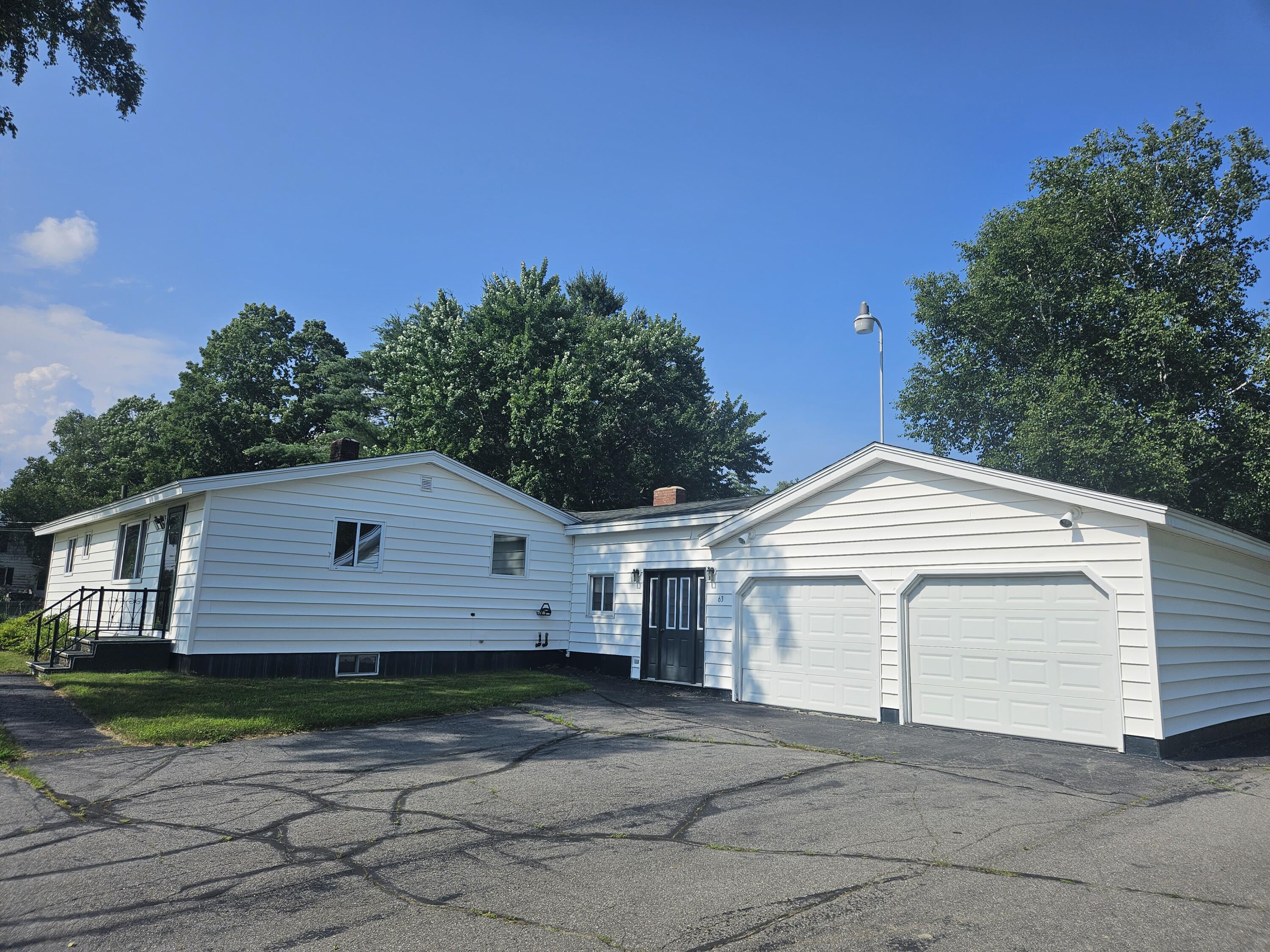 63 Water Street Howland, ME 04448 - Photo 2 of 35 2 Car Attached Garage