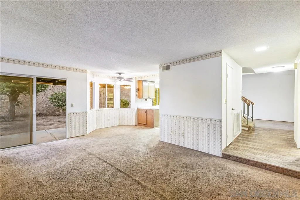 8314 Oconnell Road El Cajon, CA 92021 - Photo 8 of 25 a view of a big room with windows and entryway of a livingroom