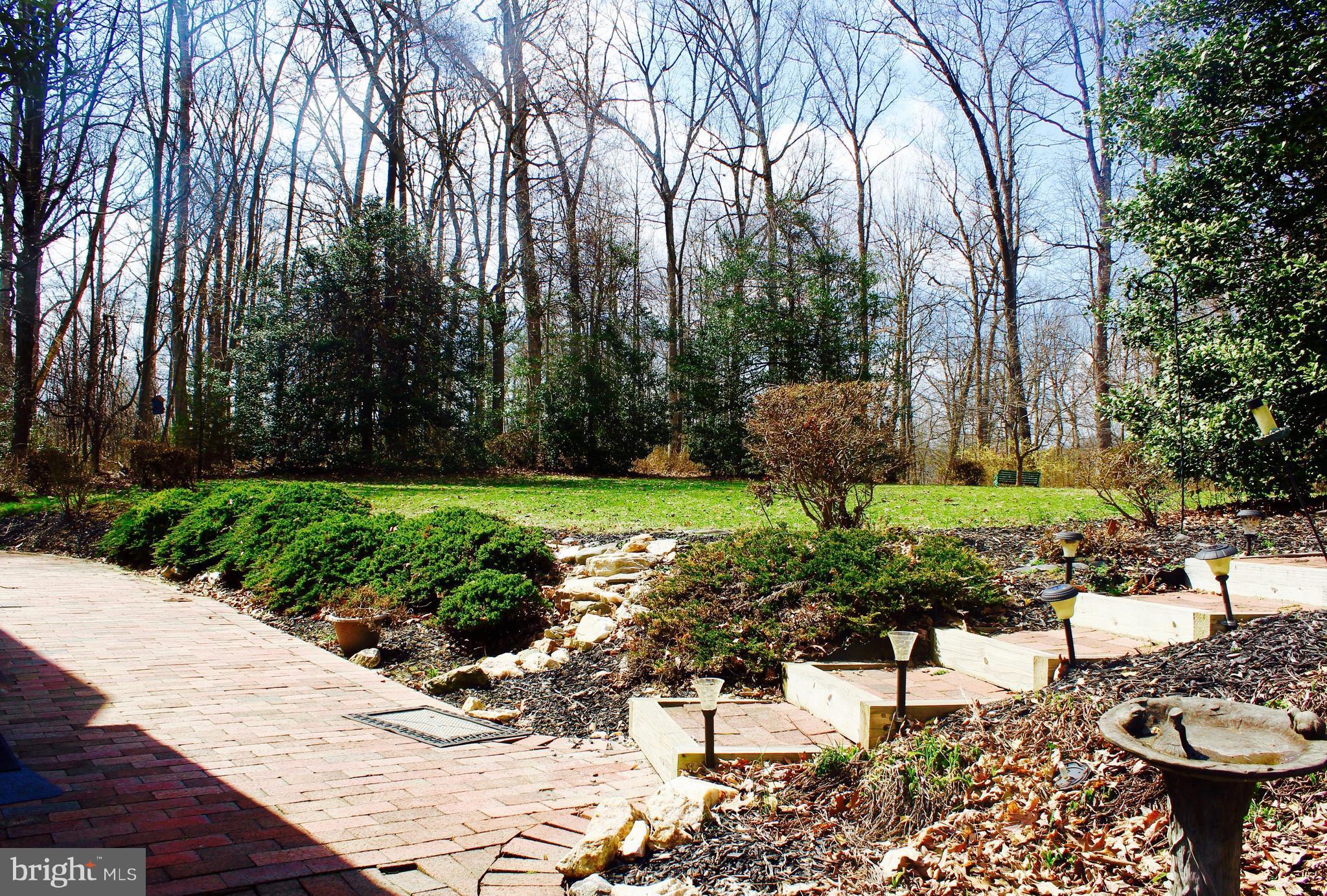 Beautiful landscaped stairs leading to front door