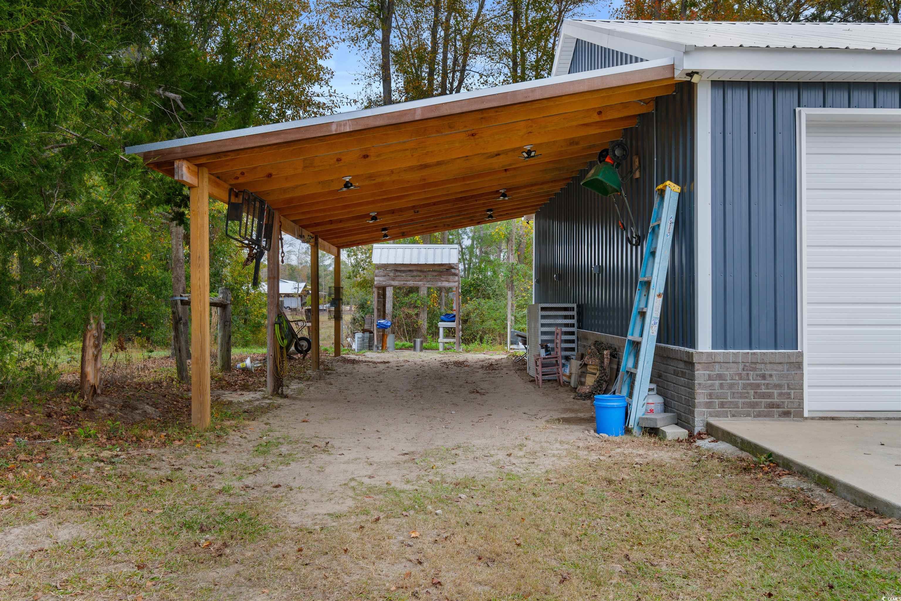 2849 Truluck Johnson Road Aynor, SC 29511 - Photo 32 of 40 View of parking with a carport
