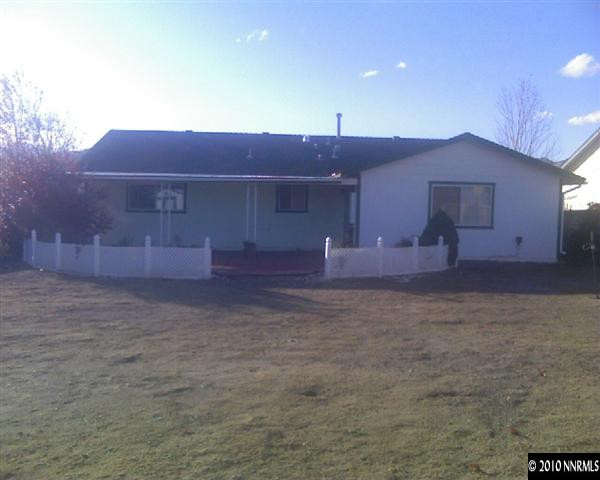 568 Yellow Jacket Road Dayton, NV 89403 - Photo 3 of 13 a view of a house with a yard