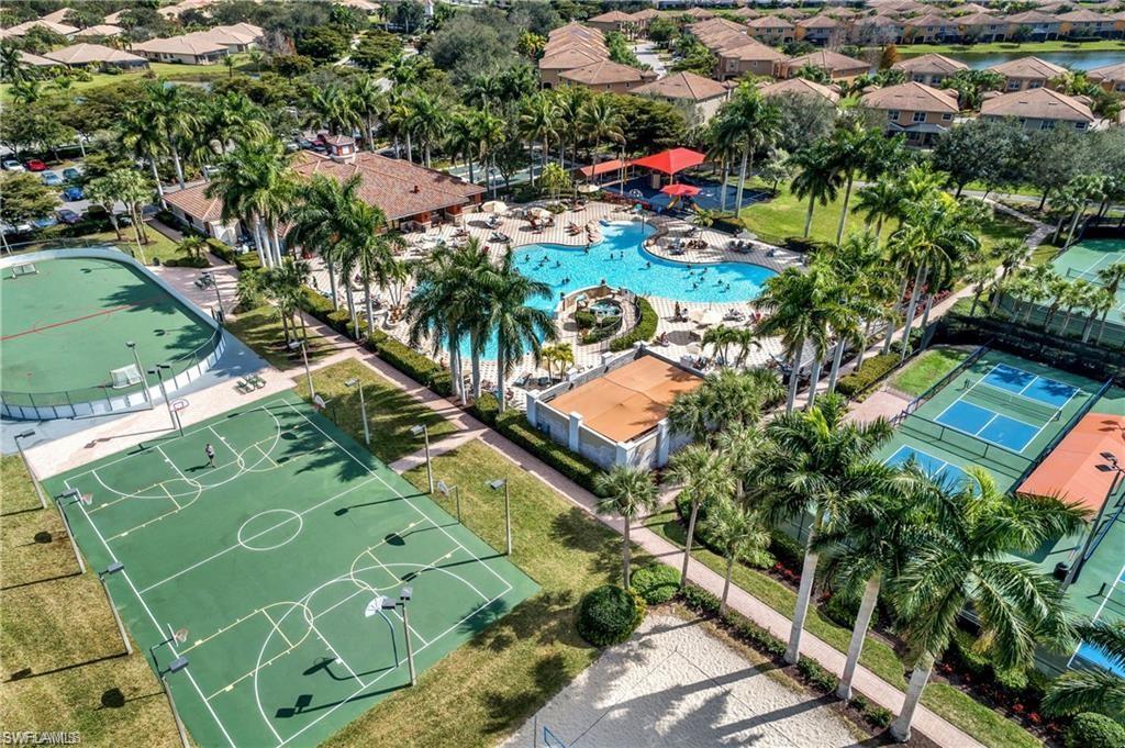 20437 Ardore Lane Estero, FL 33928 - Photo 31 of 36 an aerial view of a houses with a yard