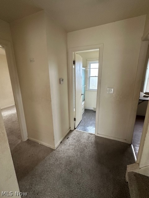 21400 Watson Road Maple Heights, OH 44137 - Photo 6 of 24 Corridor with dark colored carpet