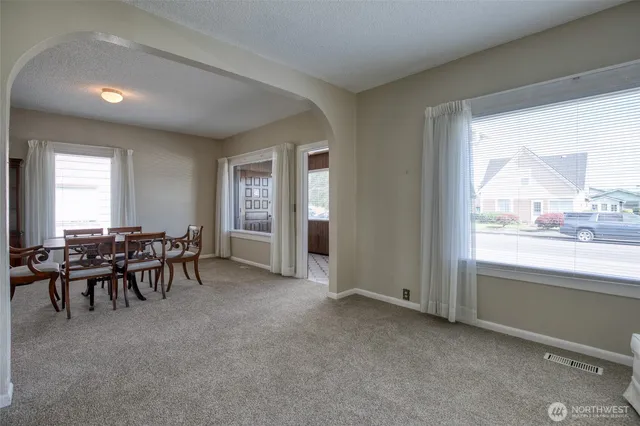 a view of a livingroom with furniture and window