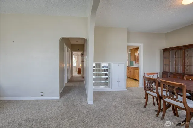 a view of a livingroom with furniture and window