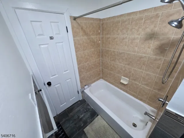 a bathroom with a sink and a shower