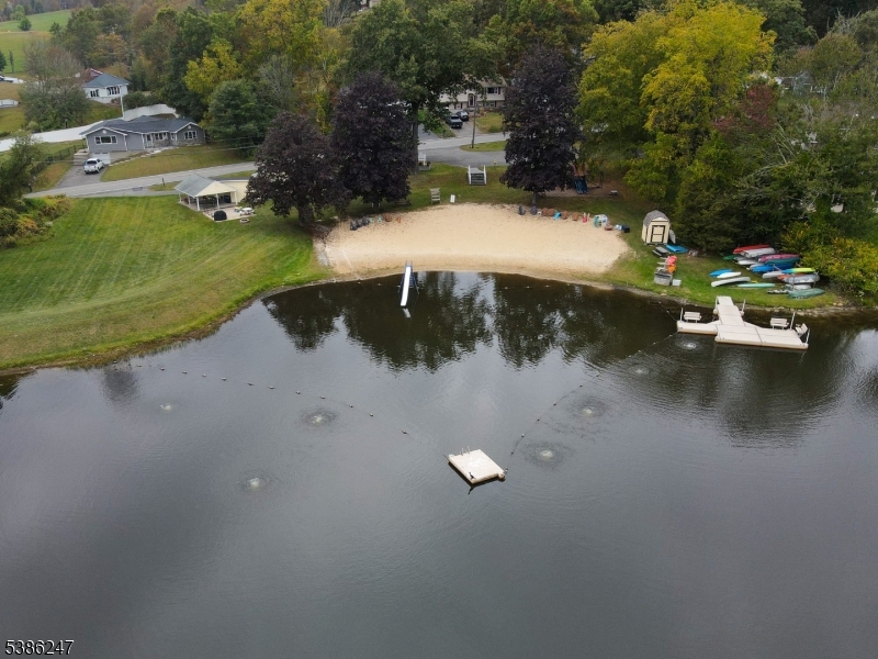 99 Seneca Lake Road Sparta, NJ 07871 - Photo 3 of 7 an aerial view of a house with a yard
