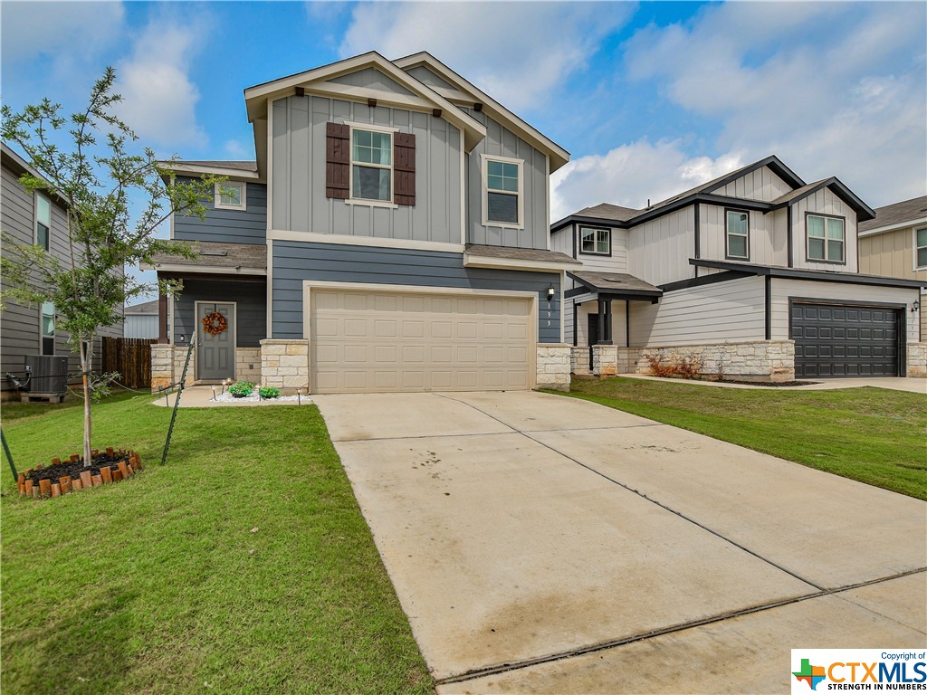133 Spotted Rail Ridge Leander, TX 78641 - Photo 1 of 1 a front view of house with yard and green space