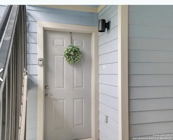 a view of staircase with large window