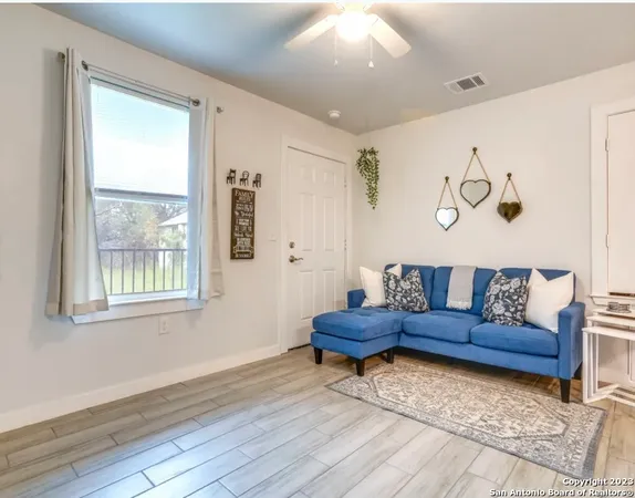 a living room with a couch and a table