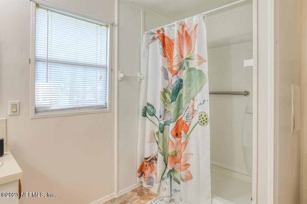 2221 Twin Fox Trail St. Augustine, FL 32086 - Photo 20 of 36 view with painting on the wall and a potted plant
