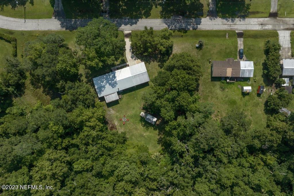 2221 Twin Fox Trail St. Augustine, FL 32086 - Photo 34 of 36 an aerial view of a house with a yard