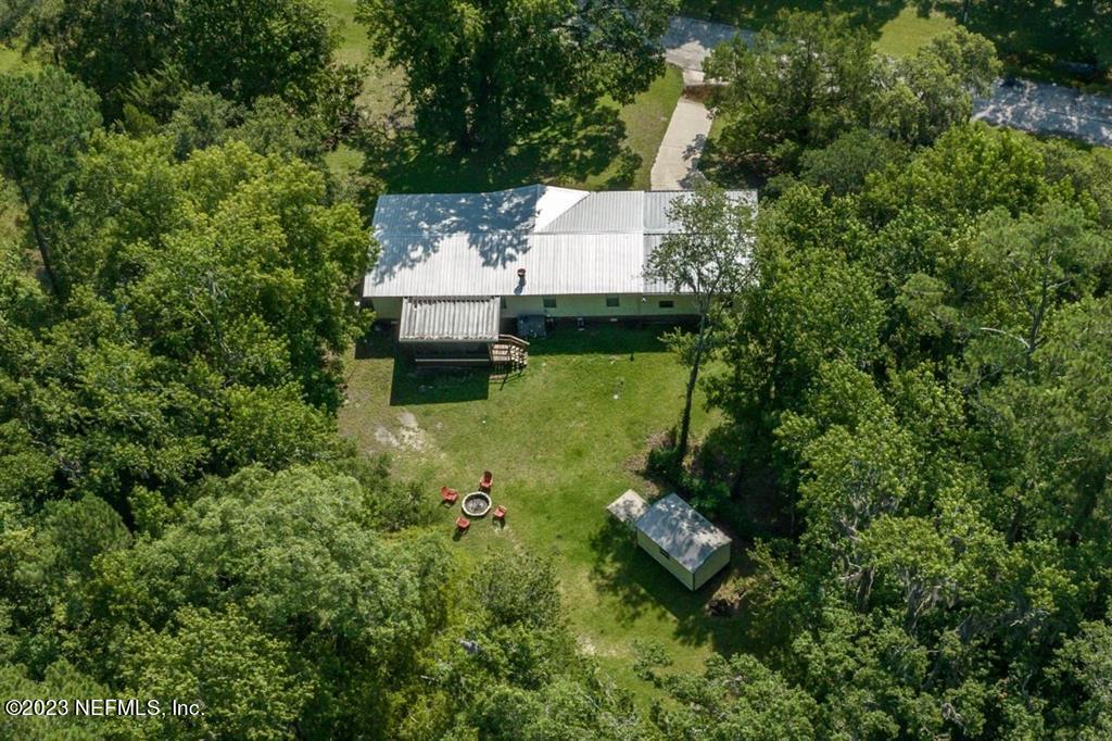 2221 Twin Fox Trail St. Augustine, FL 32086 - Photo 35 of 36 an aerial view of a house with a yard