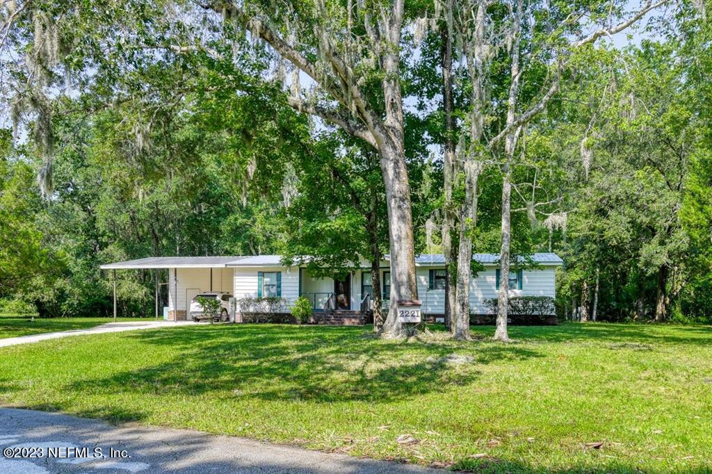 2221 Twin Fox Trail St. Augustine, FL 32086 - Photo 6 of 36 a view of house with backyard space and garden