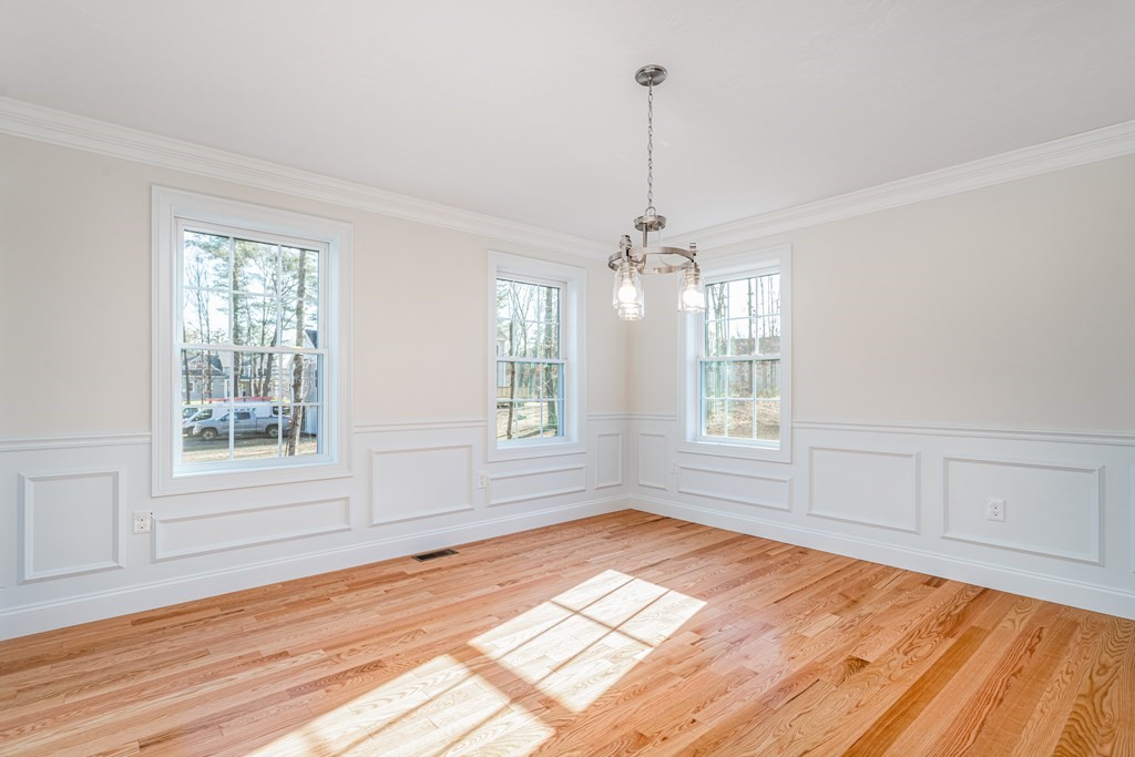 512 Northfield Road Lunenburg, MA 01462 - Photo 15 of 33 a view of empty room with wooden floor and fan