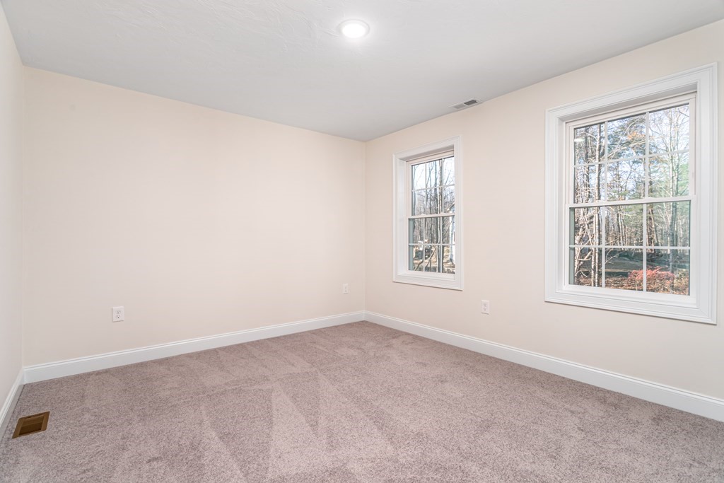 512 Northfield Road Lunenburg, MA 01462 - Photo 28 of 33 an empty room with a window