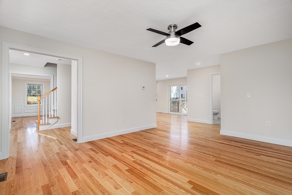 512 Northfield Road Lunenburg, MA 01462 - Photo 4 of 33 a view of empty room with wooden floor and ceiling fan